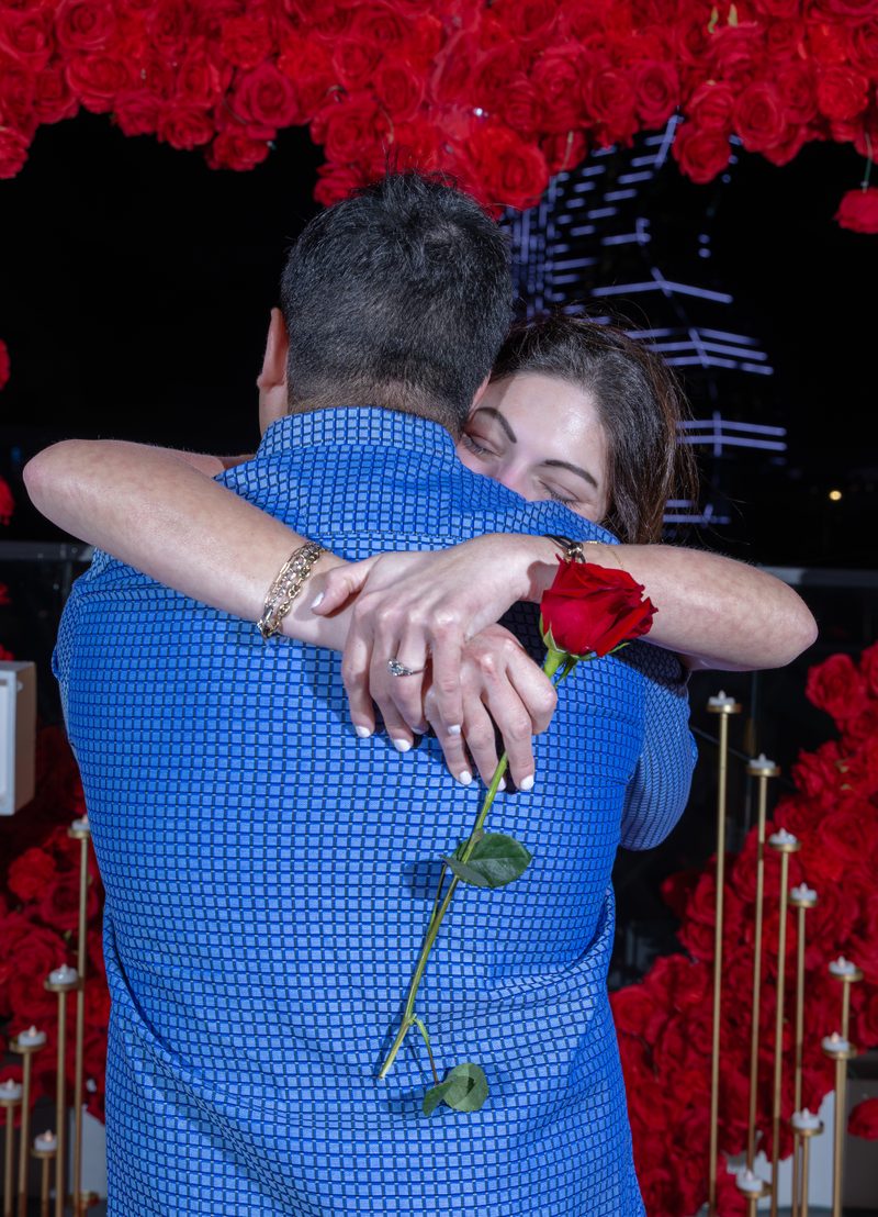 Embracing with a rose